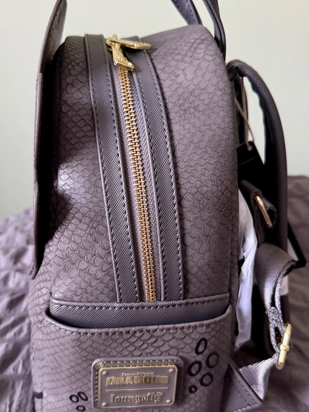 Loungefly Black Dragon Character Backpack with Yellow Eyes